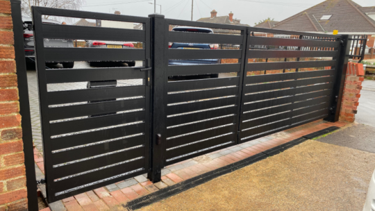 metal bi-folding gate